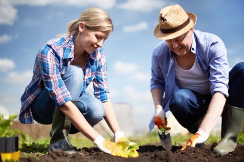 Local team planning garden drainage work for a Hillingdon property
